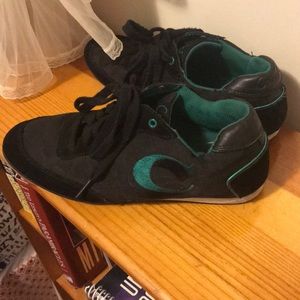 Black and green Coach sneakers